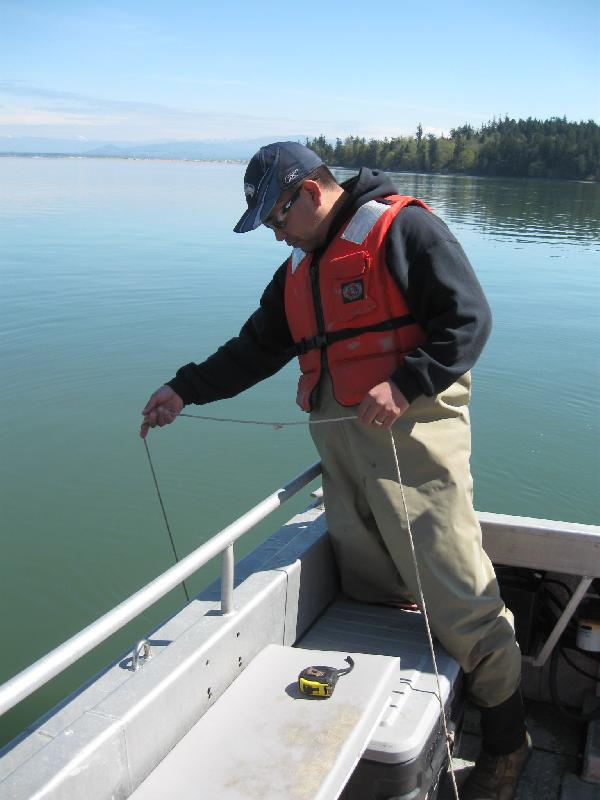 Frank Lawrence III measuring Water Quality